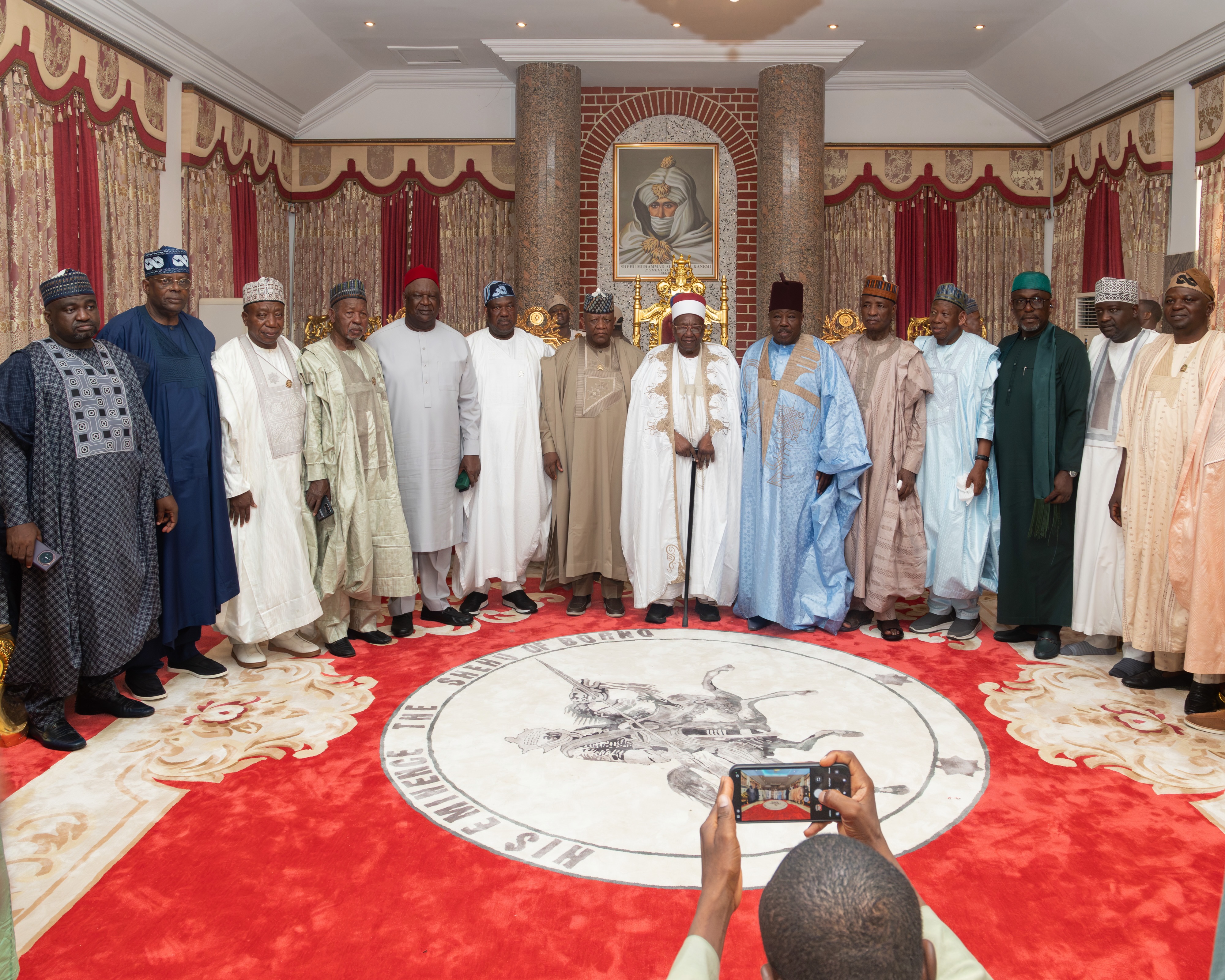 Participants gather for a photograph after the palace meeting.