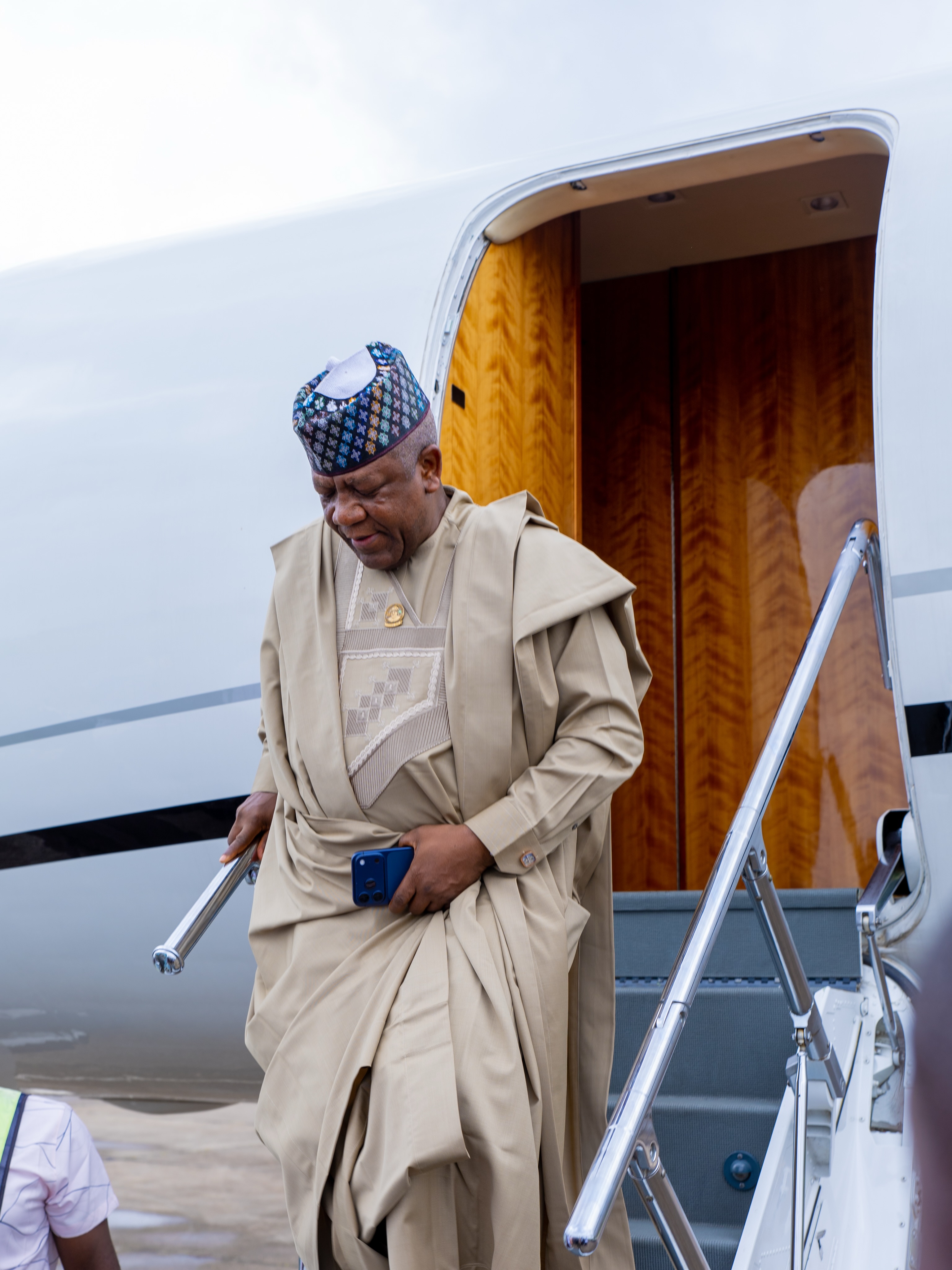 Senator Abdulaziz Yari on the aircraft steps during the Benin visit.