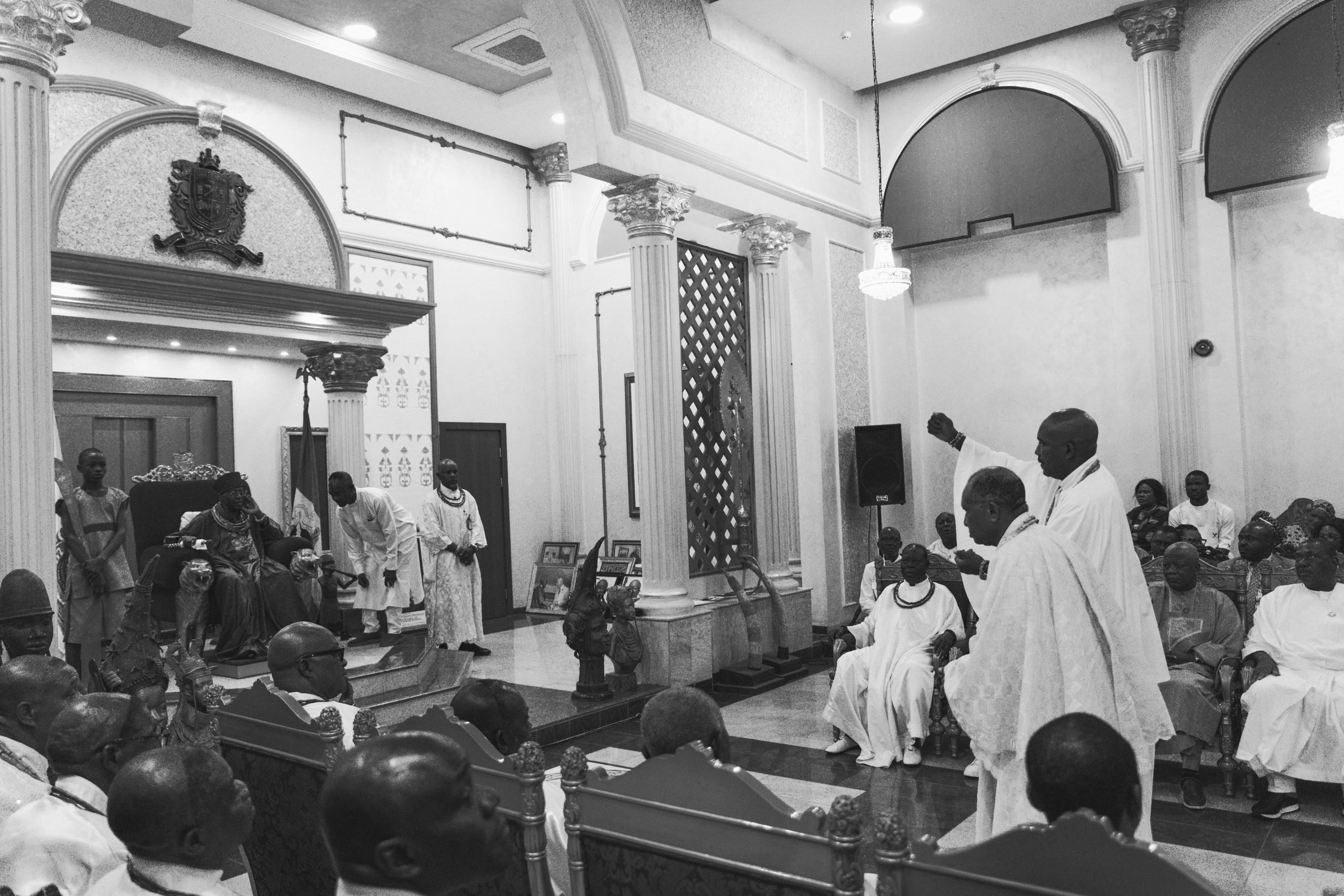A black-and-white view of the delegation during the palace audience.