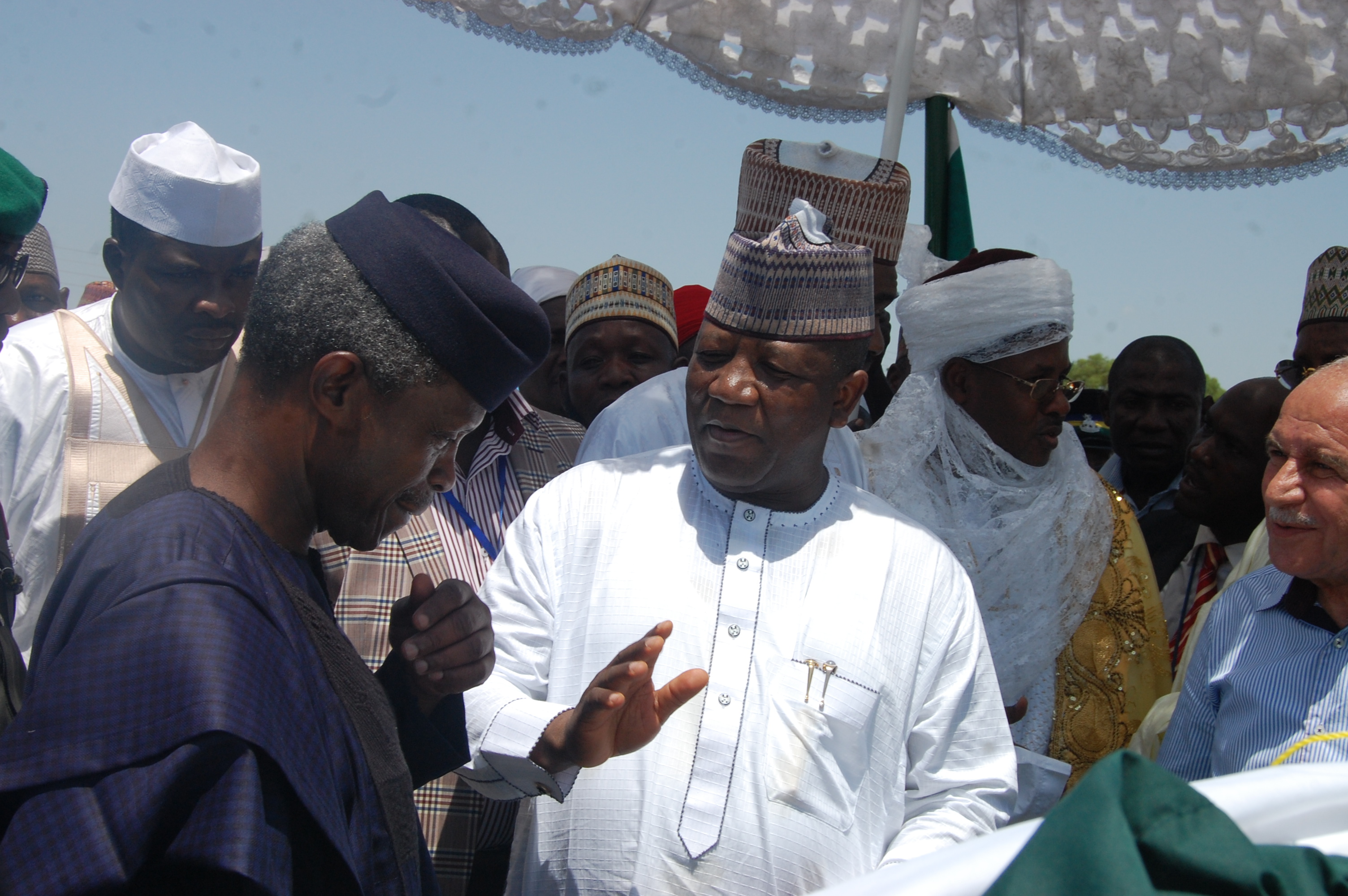Governor Abdulaziz Yari in conversation with Vice President Yemi Osinbajo during a project visit.